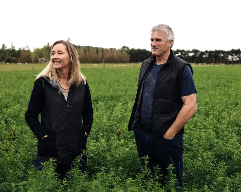 Maury Leyland and John Penno standing in an alfalfa crop