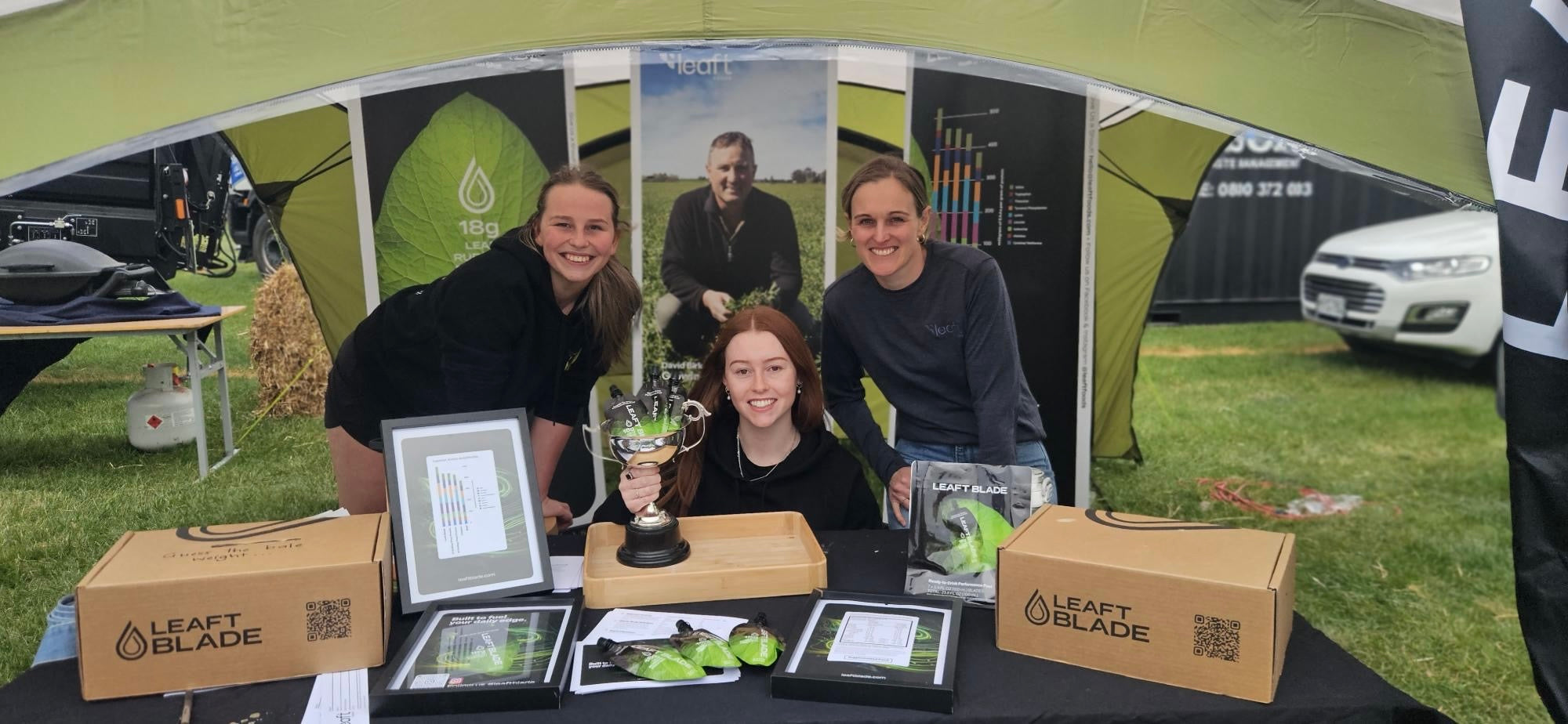 Leaft team receiving a trophy